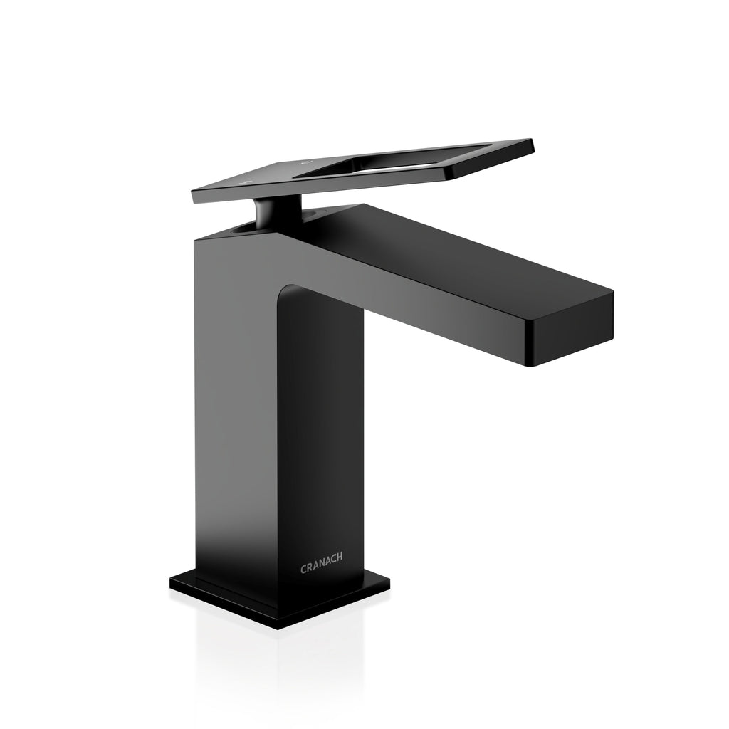 A modern single-handle bathroom faucet in a glossy black finish, featuring a rectangular spout and a flat lever handle on top